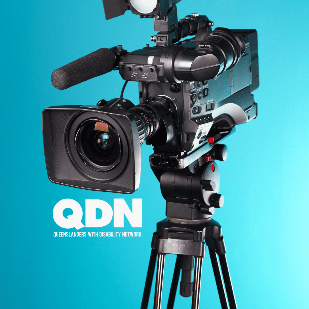 A large black video camera on a tripod is in front of an aqua background and the words Q D N, Queenslanders with Disability Network in white.